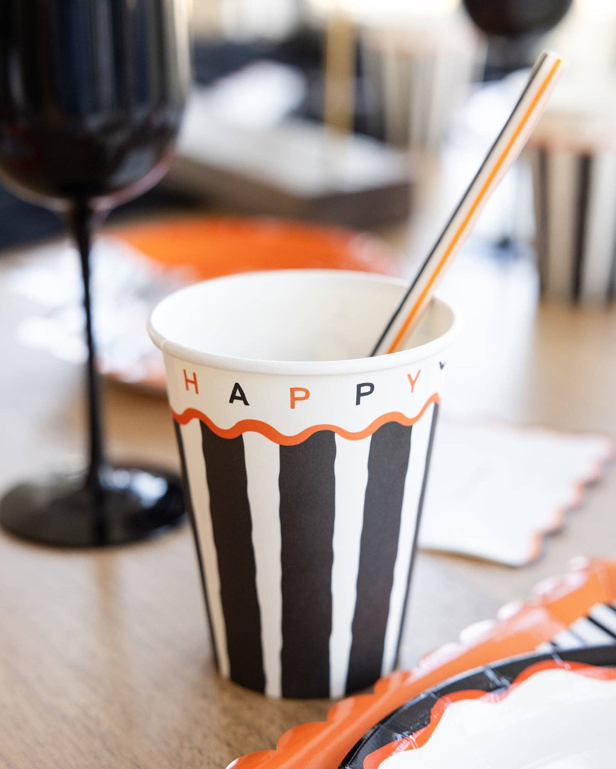 Close-up of the striped pattern and "HAPPY HALLOWEEN" wordmark.