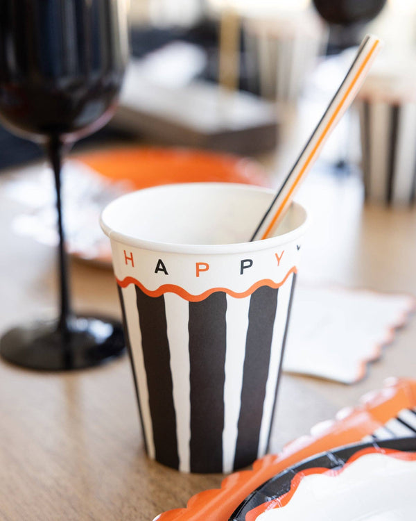 Close-up of the striped pattern and "HAPPY HALLOWEEN" wordmark.