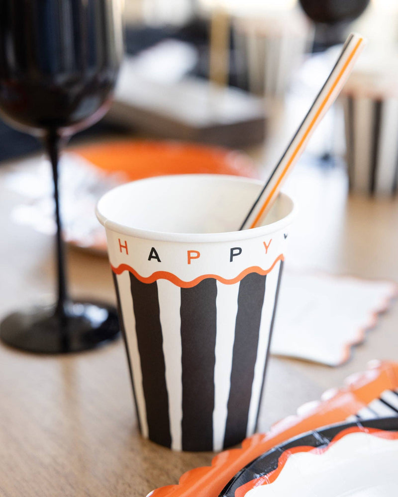 Close-up of the striped pattern and "HAPPY HALLOWEEN" wordmark.