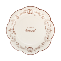 Cream paper plate with a brown "HAPPY HARVEST" text and autumnal designs, front view.
