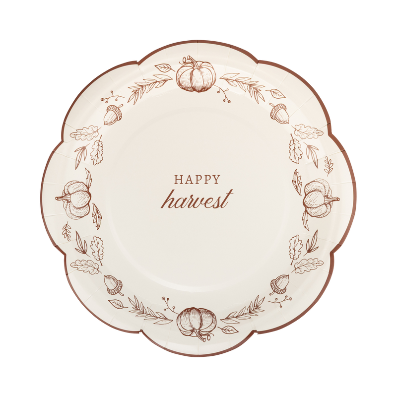 Cream paper plate with a brown "HAPPY HARVEST" text and autumnal designs, front view.