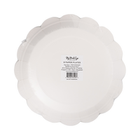 Black Happy New Year paper dinner plates shown in back packaging