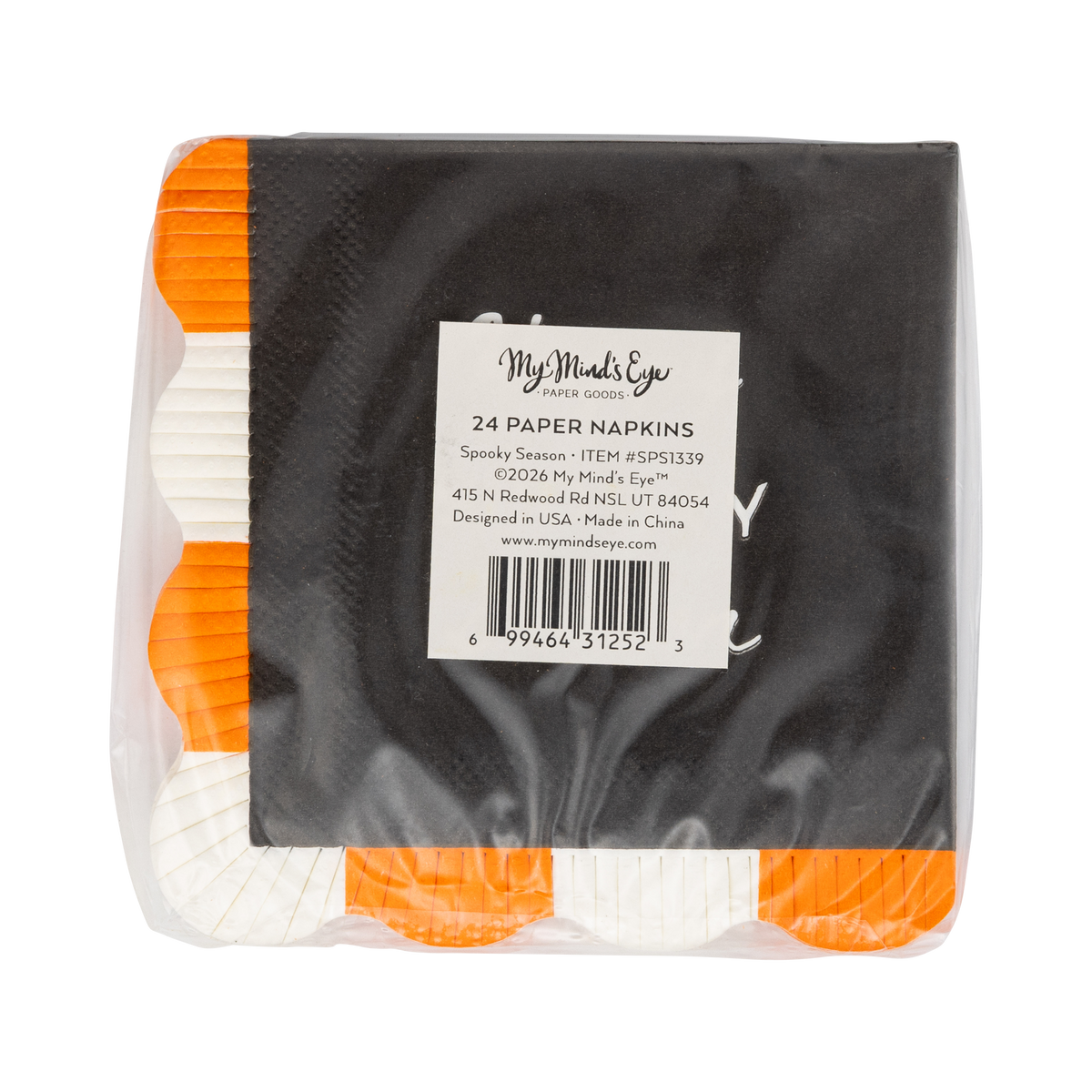 Back of the retail package: a clear bag with a product label reading "24 Paper Napkins • Spooky Season • SPS1339"; the stacked black napkins show their orange-and-cream fringed scalloped edge along the left side. Straight-on packaging shot.