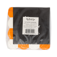 Back of the retail package: a clear bag with a product label reading "24 Paper Napkins • Spooky Season • SPS1339"; the stacked black napkins show their orange-and-cream fringed scalloped edge along the left side. Straight-on packaging shot.