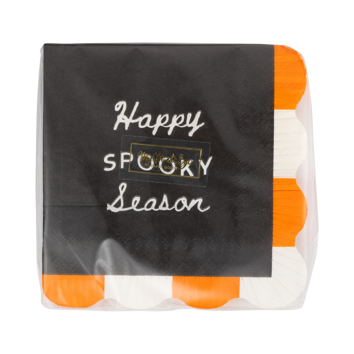 Front of the retail package: the top black napkin reads "Happy Spooky Season" in cream script and block capitals with a small gold brand sticker centered, and the orange-and-cream fringe edge peeks out at the right. Straight-on packaging shot.
