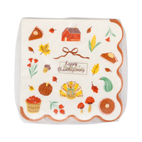 Stack of 24 harvest icon cocktail napkins fanned with Thanksgiving-themed illustrations on a clear packaging.