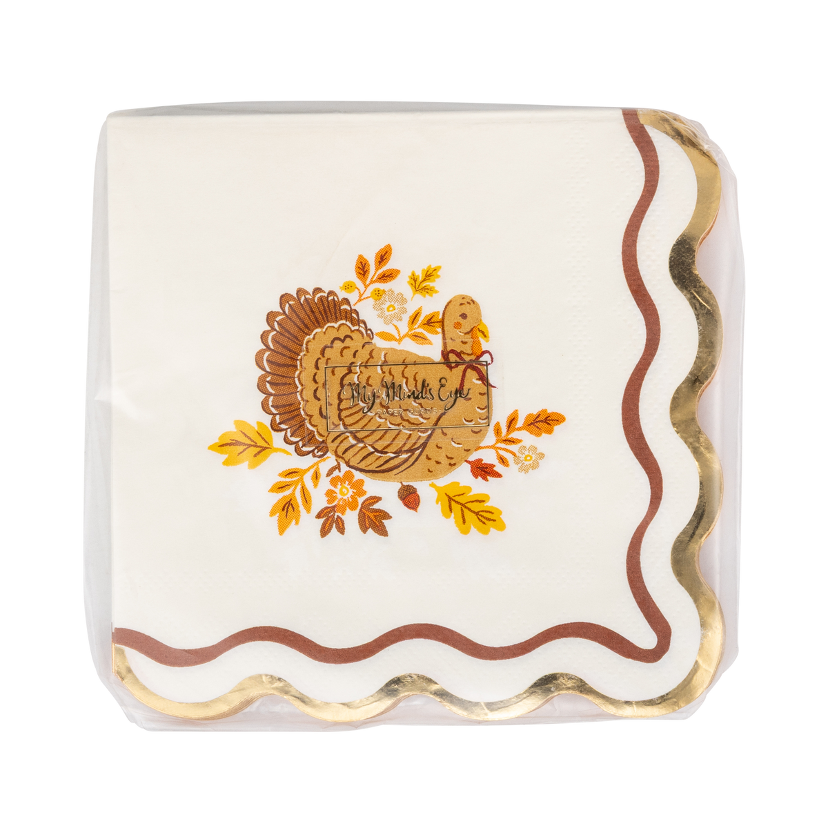Stack of harvest turkey cocktail napkins showing the turkey illustration and wavy orange edge from an angled view.