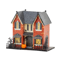 Madame Mystic light up haunted house Halloween village in red brick glitter with gravestones, black cat window and iron fence