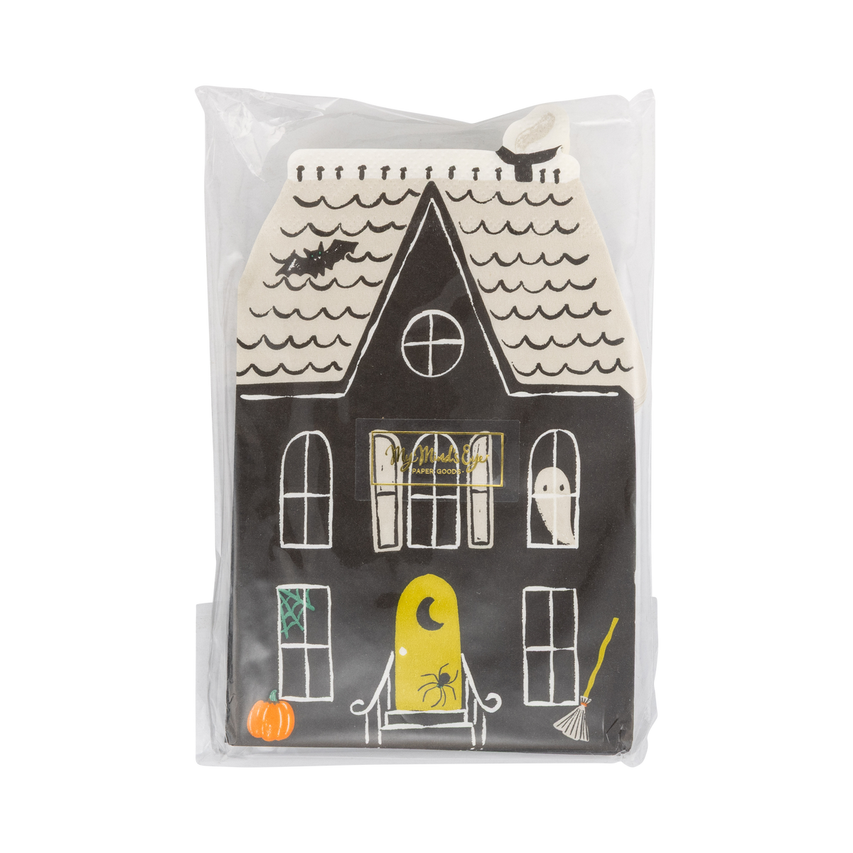 Front of the retail package: the top haunted house napkin face-up with a small gold brand sticker, showing the black mansion with arched white windows, a ghost, a bat, green spiderweb, broom, pumpkin, and yellow crescent-moon door. Straight-on packaging shot.