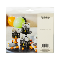 Back of the retail package: clear bag with a product label reading "Six Treat Boxes • 4" x 5" x 2¾"" and item number SPS1308, with a cover photo of three assembled houses among balloons. Straight-on packaging shot.