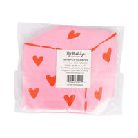 Back view of heart dice napkin package with product label.