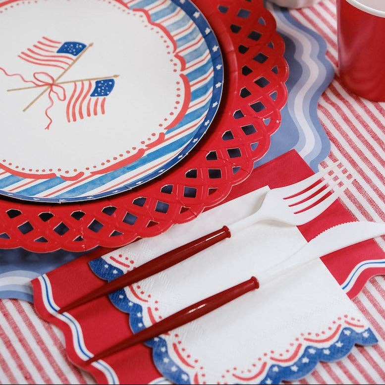 Patriotic Guest Towels paired with white utensils and flag plates for a classic summer look.