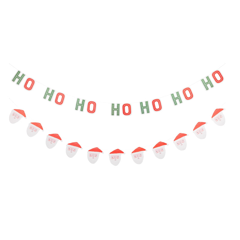 Ho Ho Ho lettered banner and Santa face garland shown laid flat