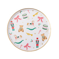 Holiday Toys Christmas plate with nutcrackers, teddy bears, rocking horses, and drums, shown top-down