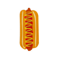 Hot dog shaped paper guest napkin on white, die-cut as a hot dog in a bun with a yellow mustard squiggle over red ketchup.