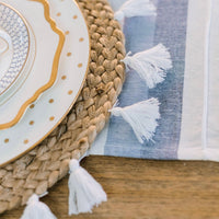 Refresh your table setting with our fringed Rattan Braided Placemats. These Rattan Placemats are a must-have for any stylish Everyday Table and are the essence of effortless summer style. Add a bohemian flair to every meal with these versatile Summer Placemats.