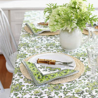 Discover the perfect backdrop for your summer celebrations with our Green Floral Tablecloth. Measuring 60"x 92", this tablecloth combines practicality with style, making it an essential addition to your garden party decor. Made from soft, durable cotton with a vibrant green and white block print, it’s not just a tablecloth—it’s a part of the party. Your guests will love this eye-catching floral tablecloth.