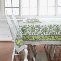 Discover the perfect backdrop for your summer celebrations with our Green Floral Tablecloth. Measuring 60"x 92", this tablecloth combines practicality with style, making it an essential addition to your garden party decor. Made from soft, durable cotton with a vibrant green and white block print, it’s not just a tablecloth—it’s a part of the party. Your guests will love this eye-catching floral tablecloth.