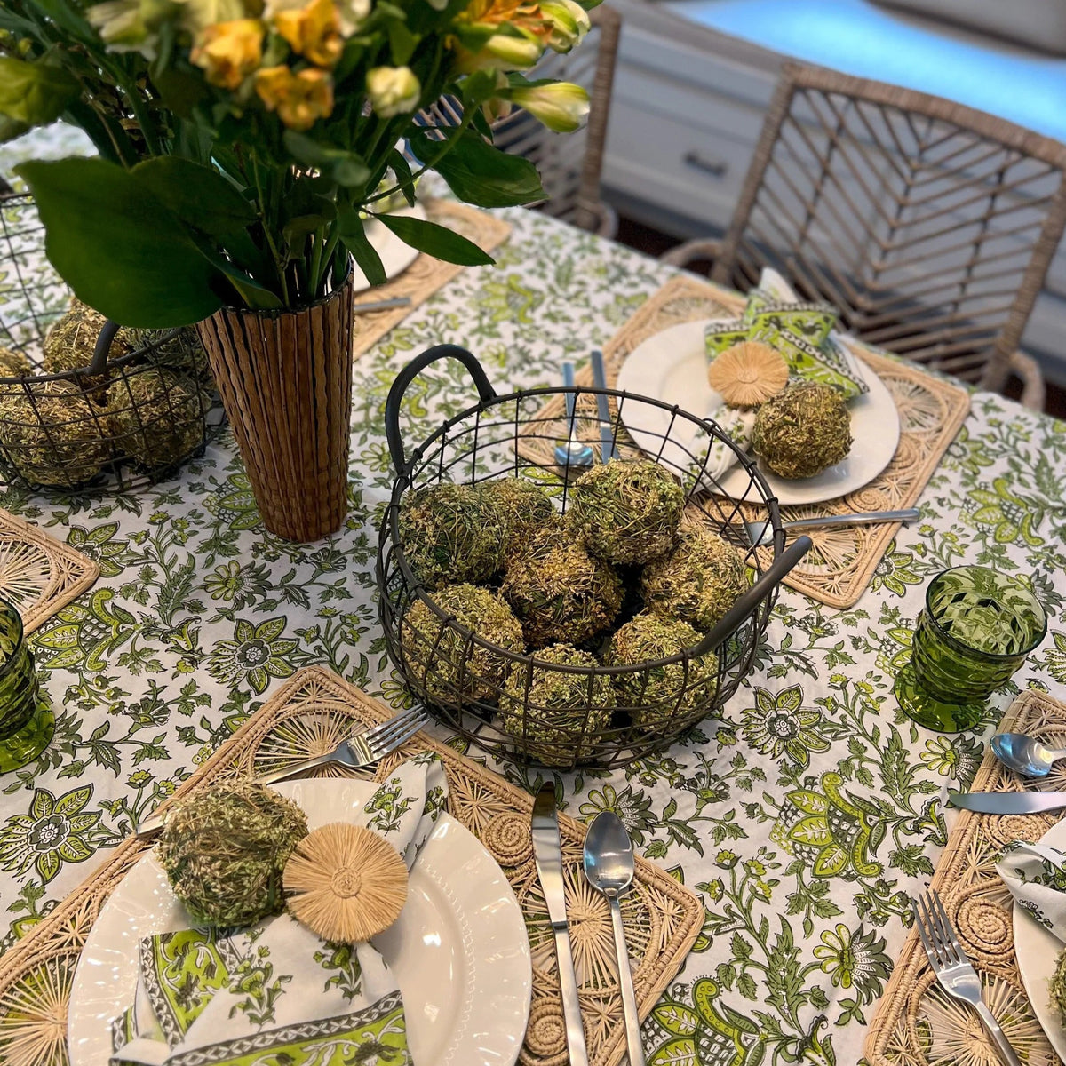 Discover the perfect backdrop for your summer celebrations with our Green Floral Tablecloth. Measuring 60"x 92", this tablecloth combines practicality with style, making it an essential addition to your garden party decor. Made from soft, durable cotton with a vibrant green and white block print, it’s not just a tablecloth—it’s a part of the party. Your guests will love this eye-catching floral tablecloth.