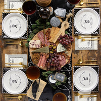 Black paper table runner with white wording boo - perfect for a halloween table. 