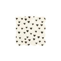 White paper cocktail napkins with small black hearts and scalloped edges - perfect for valentines day, galentines day or an anniversary party