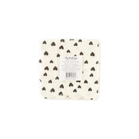 White paper cocktail napkins with small black hearts and scalloped edges - perfect for valentines day, galentines day or an anniversary party