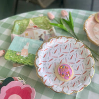 Paper Easter plates with scalloped edges and a carrot design - perfect for an Easter party or brunch