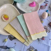 Pastel gingham paper dinner napkins perfect for Easter, baby shower or a first birthday party.