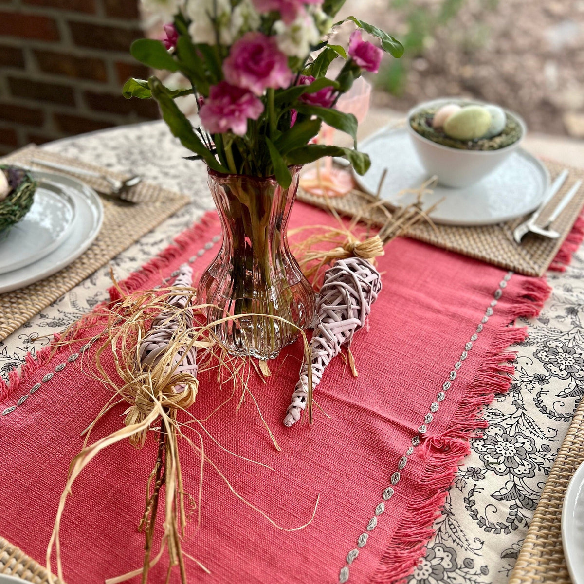 Light pink Easter Carrot Decoration with a rustic straw bow