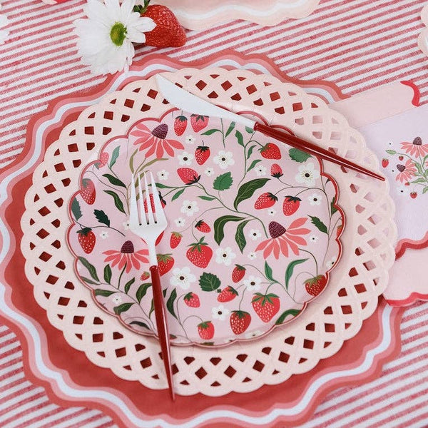 Strawberry Paper Plate styled with white cutlery and a strawberry for a Summer Picnic.