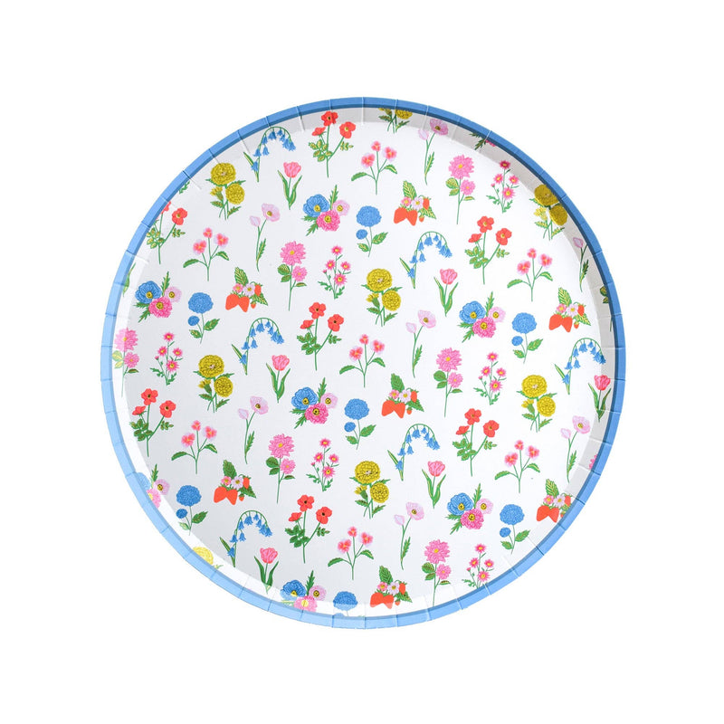 Round dessert plate with colorful spring wildflower pattern and blue rim