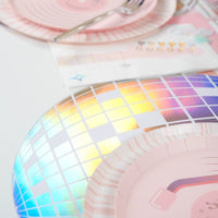 Close-up of the iridescent finish on a disco ball placemat showing how it catches the light at the edges.