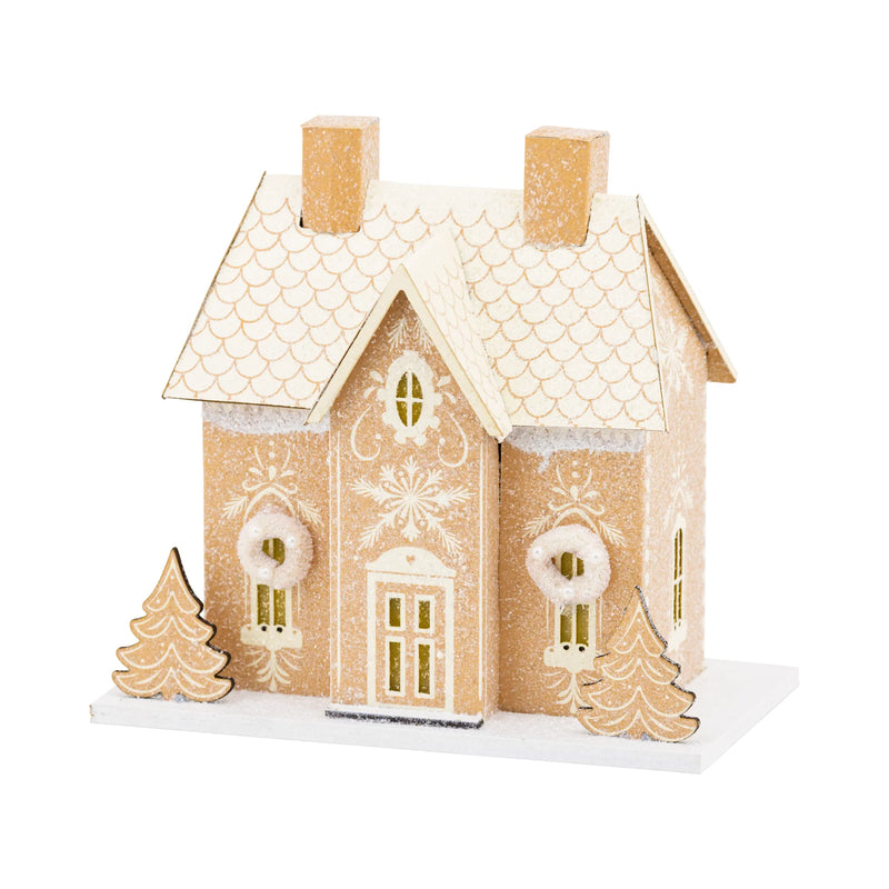 Isolated view of the gingerbread house putz house (Gingerbread Manor) with twin chimneys and intricate "icing" details.