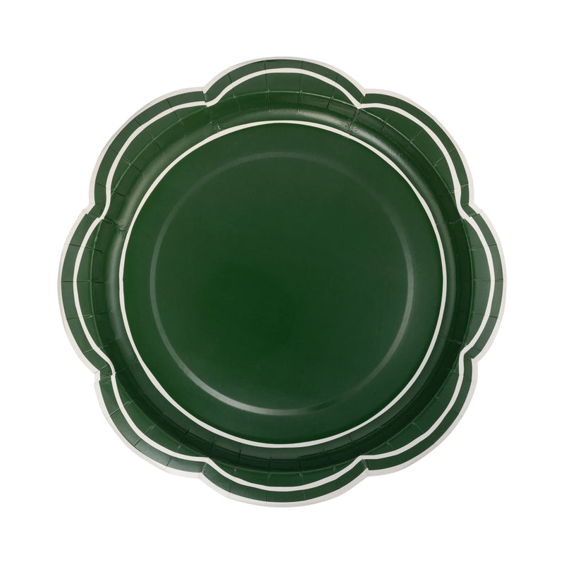 Isolated view of a single deep green scalloped plate showing the scalloped edge and double cream border line.