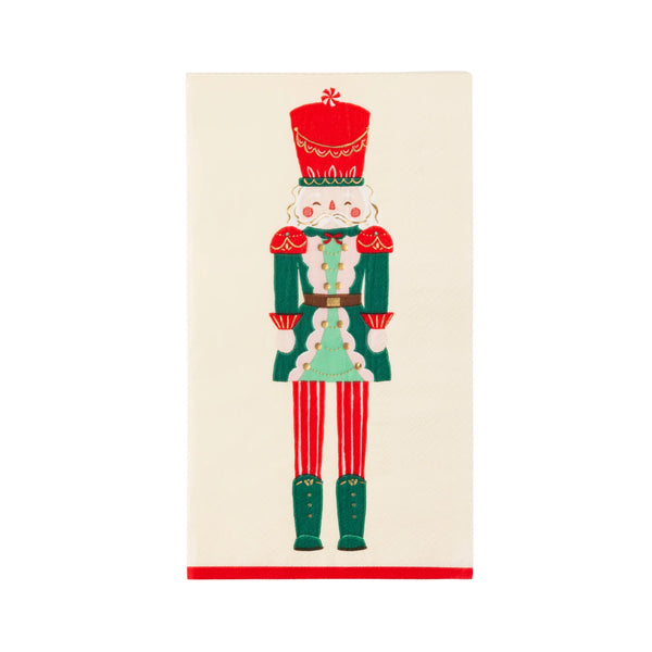 Isolated view of a single nutcracker guest towel napkin showing the full Nutcracker Prince illustration.