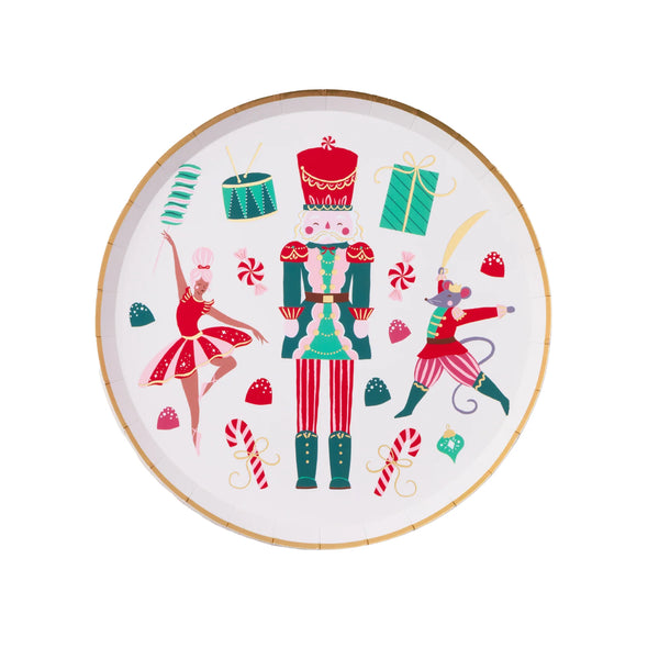 Isolated view of a single nutcracker plate showing the vibrant ballet-inspired illustrations and gold foil rim.