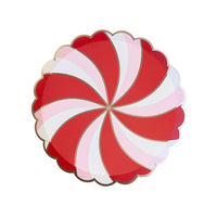 Isolated view of a single peppermint paper plate showing the red and pink candy swirl design with a gold scalloped rim.