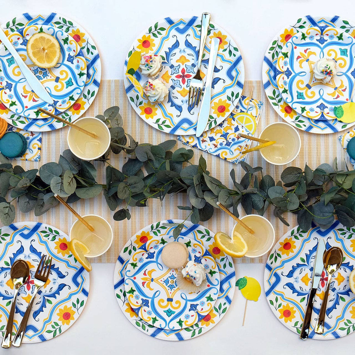 Italian themed table with colorful plates and cocktail napkins