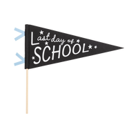 Black Last Day of School felt pennant with cream screen-printed text and stars, blue felt mini flag accents, and wooden dowel