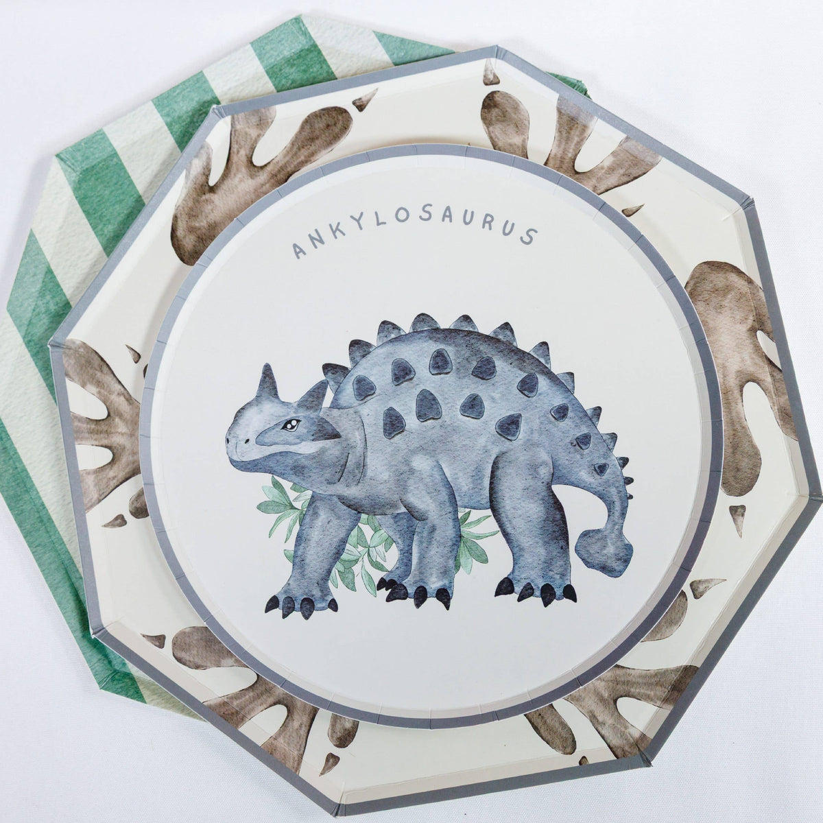Ankylosaurus plate stacked on a larger footprint plate
