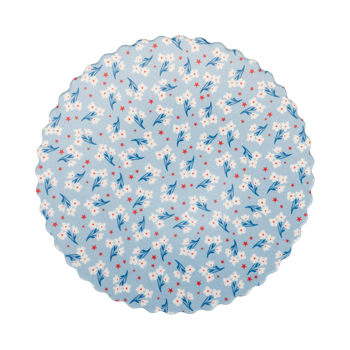 Flat lay of light blue floral bamboo plate with white blossoms and red stars on white background