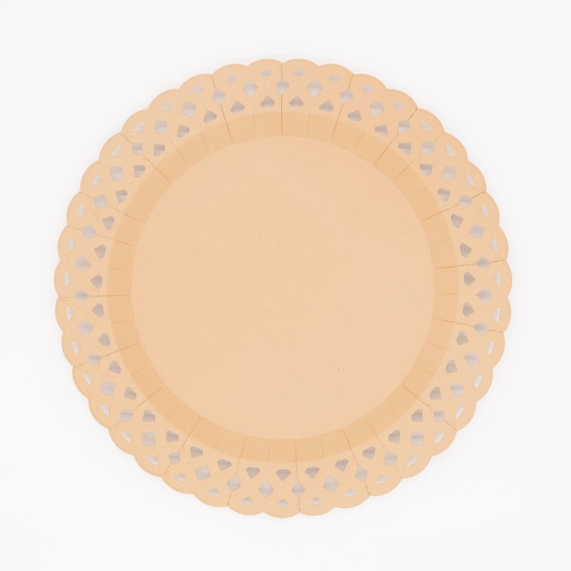 Overhead studio shot of a light brown 11.5 inch paper dinner plate featuring an embossed basketweave pattern and scalloped edges.