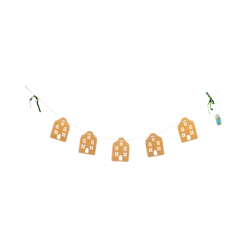Light-up banner of five kraft-brown paper Christmas houses with green velvet bows and candy-cane accents on a white background.
