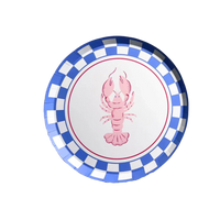 Single round paper plate with pink lobster illustration and blue white checkered border on white background
