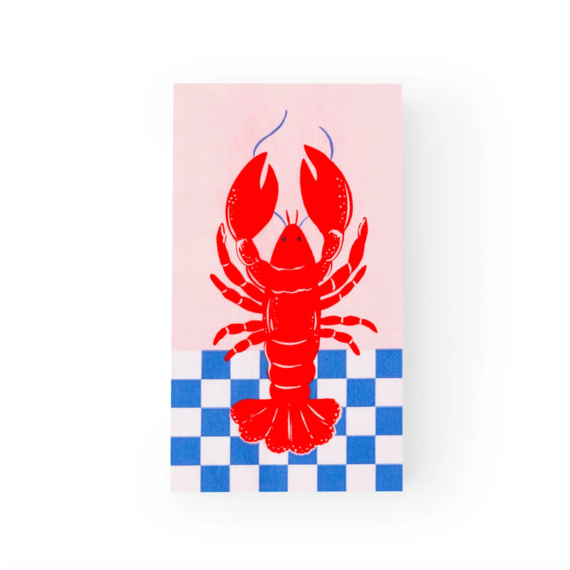 Single lobster guest towel displaying full red lobster illustration on blush background above navy checkerboard.
