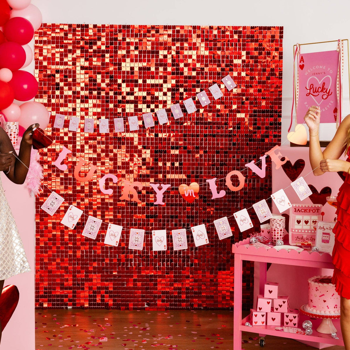 Lucky in Love Valentine banner displayed over party backdrop