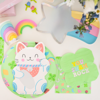 St Patrick’s Day table setup with Lucky Me napkins, plates, and rainbow accents