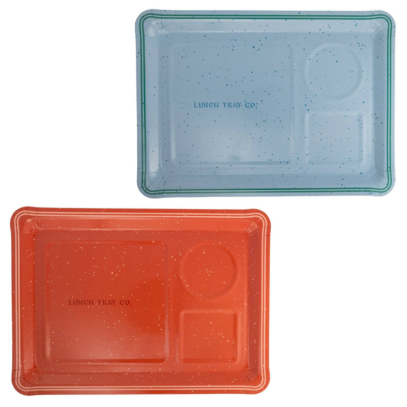 Blue and red speckled lunch tray shaped paper plates shown from above on white background
