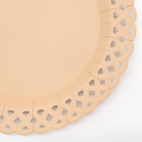 Extreme macro detail of the premium paper grain and embossed basketweave design on the neutral party plate.