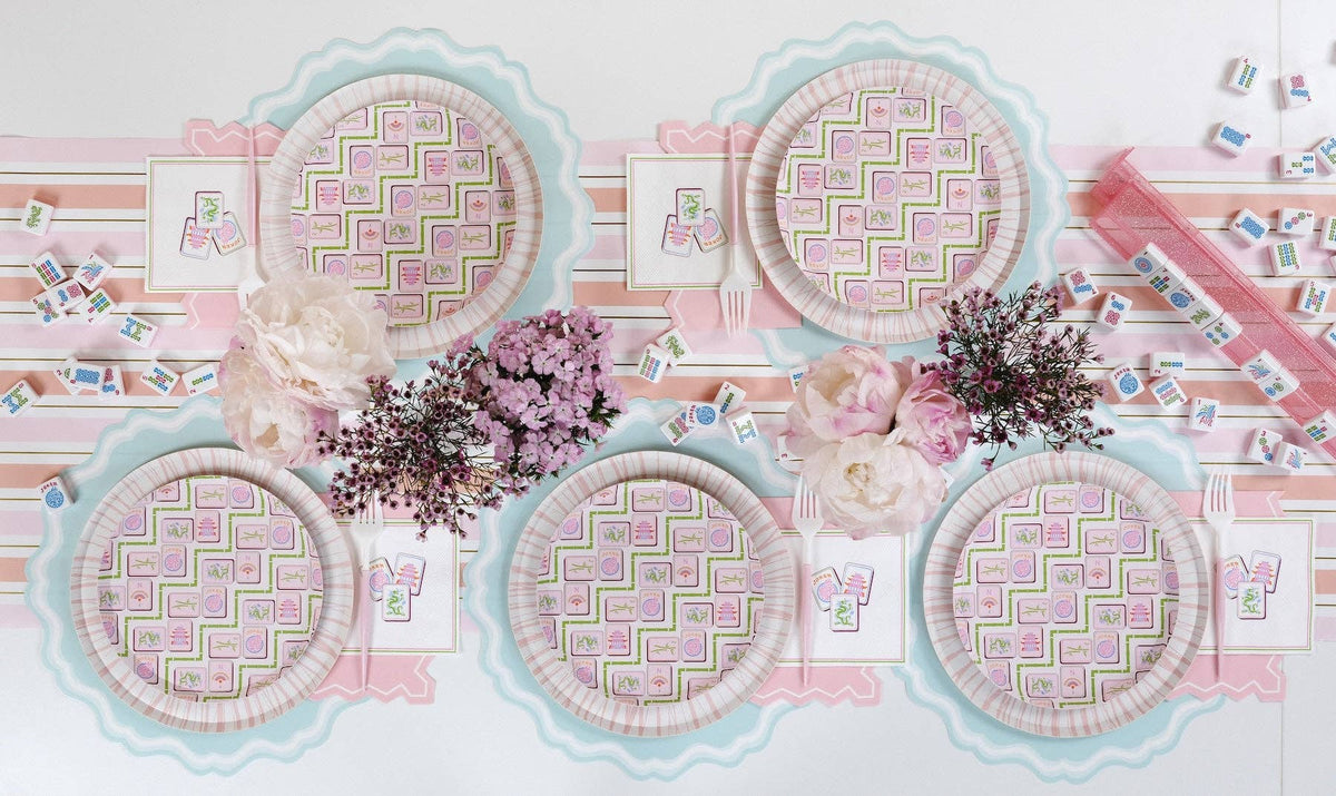 A full Chic Mahjong Game Night tablescape featuring mahjong tiles, floral arrangements, and Mahjong Cocktail Napkins.